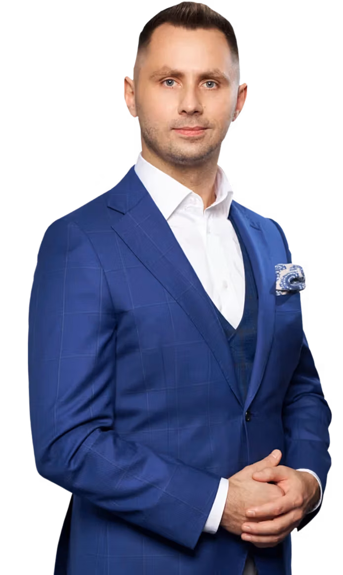 Zdzisław Bonalski, licencjonowany doradca restrukturyzacyjny, na tle Spodka w Katowicach